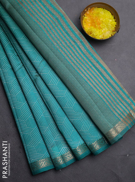 Semi raw silk saree teal blue with allover geometric prints and zari woven border