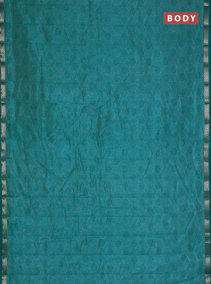 Semi raw silk saree teal blue with allover geometric prints and zari woven border