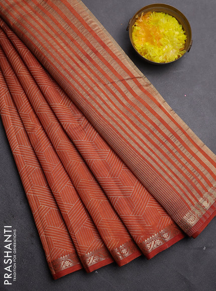 Semi raw silk saree rust shade with allover geometric prints and zari woven border