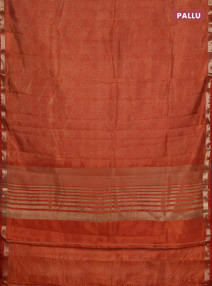 Semi raw silk saree rust shade with allover geometric prints and zari woven border