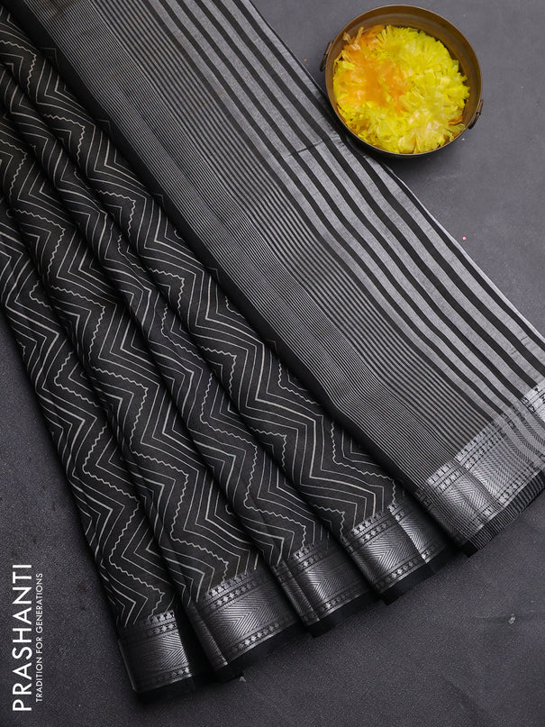 Semi raw silk saree black with allover zigzag prints and zari woven border