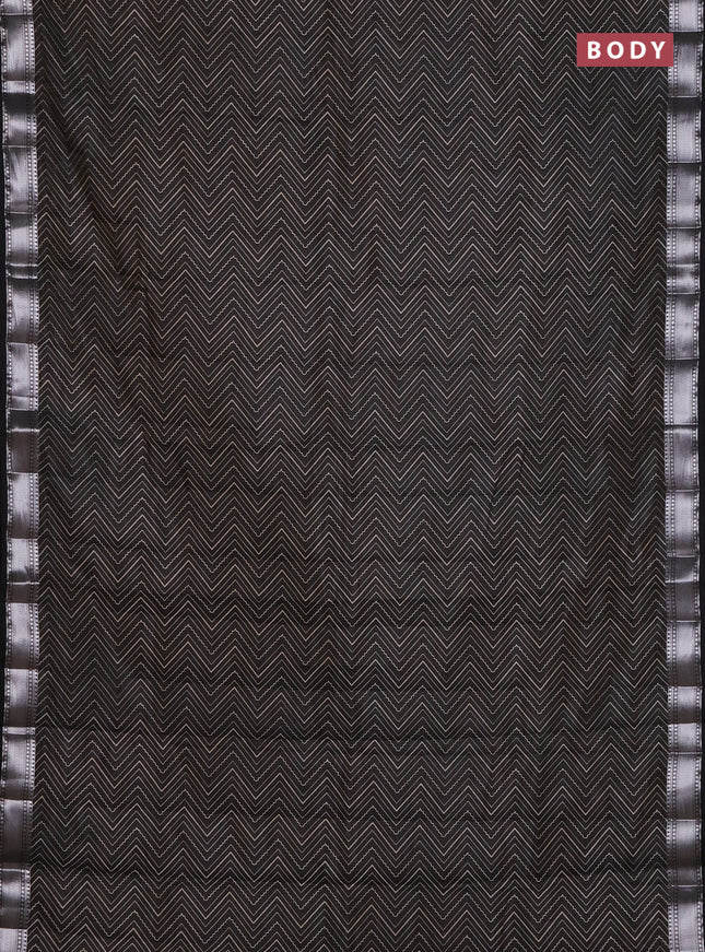 Semi raw silk saree black with allover zigzag prints and zari woven border