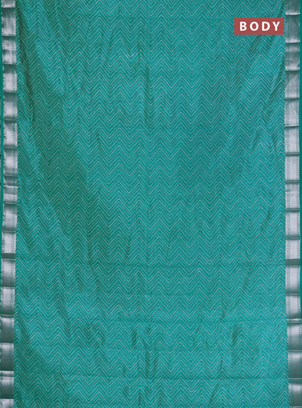 Semi raw silk saree teal blue with allover zigzag prints and zari woven border