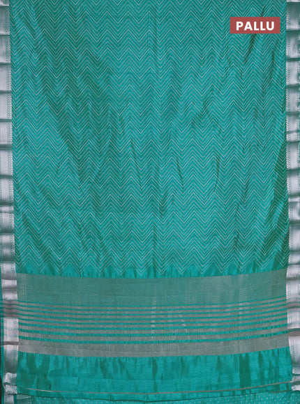 Semi raw silk saree teal blue with allover zigzag prints and zari woven border