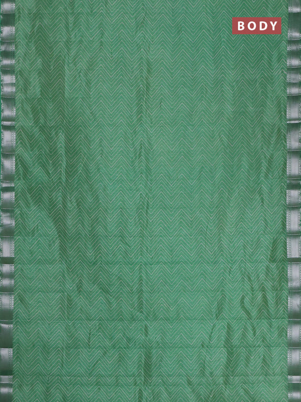 Semi raw silk saree green with allover zigzag prints and zari woven border