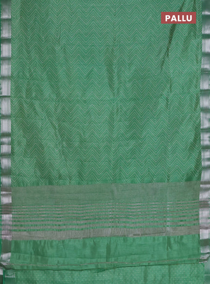 Semi raw silk saree green with allover zigzag prints and zari woven border