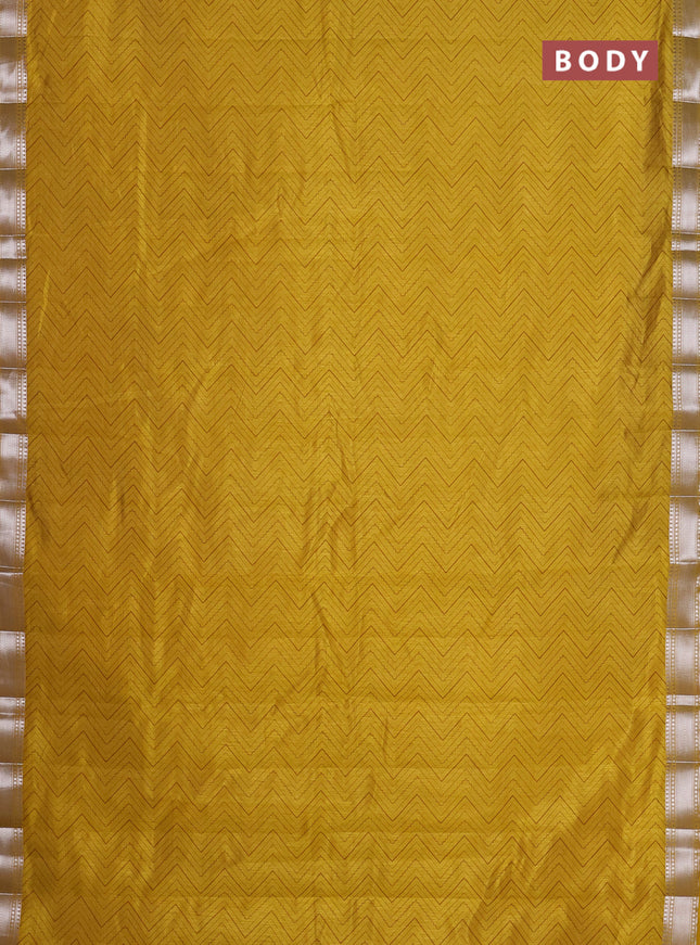 Semi raw silk saree lime yellow with allover zigzag prints and zari woven border