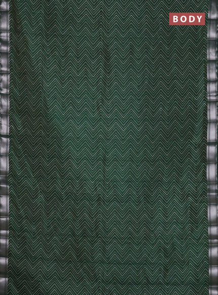 Semi raw silk saree bottle green with allover zigzag prints and zari woven border