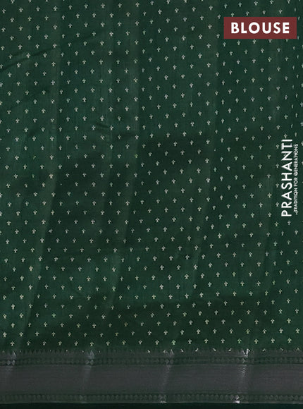 Semi raw silk saree bottle green with allover zigzag prints and zari woven border
