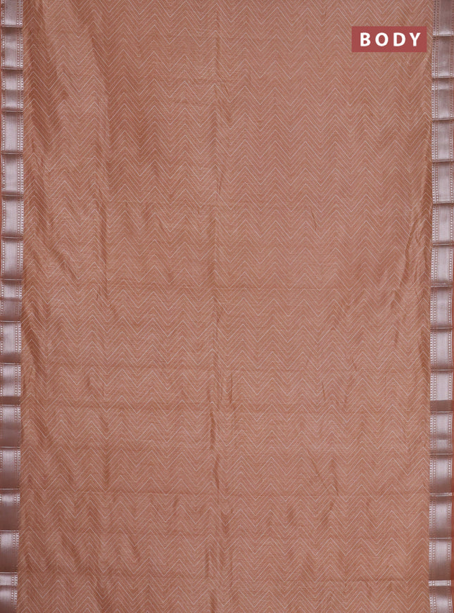 Semi raw silk saree pastel peach with allover zigzag prints and zari woven border