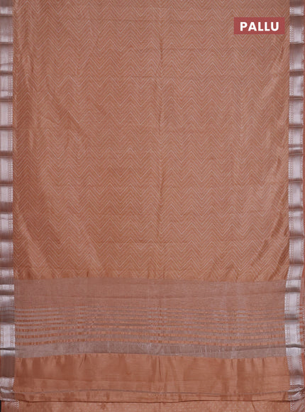 Semi raw silk saree pastel peach with allover zigzag prints and zari woven border
