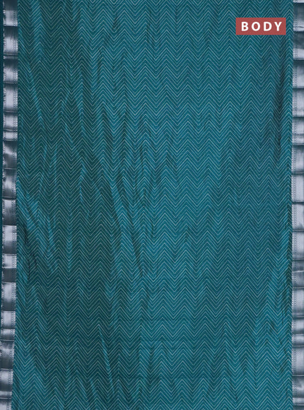 Semi raw silk saree cs blue with allover zigzag prints and zari woven border