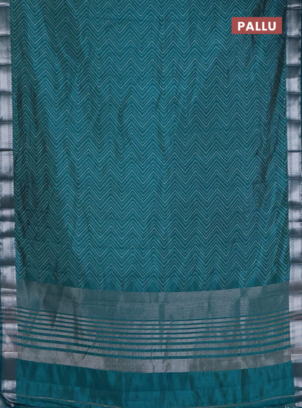 Semi raw silk saree cs blue with allover zigzag prints and zari woven border