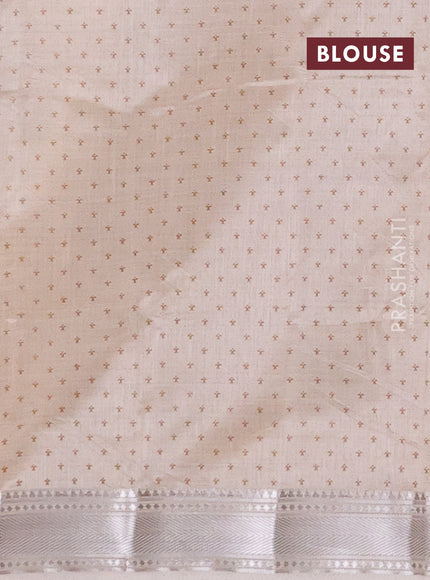 Semi raw silk saree cream with allover zigzag prints and zari woven border