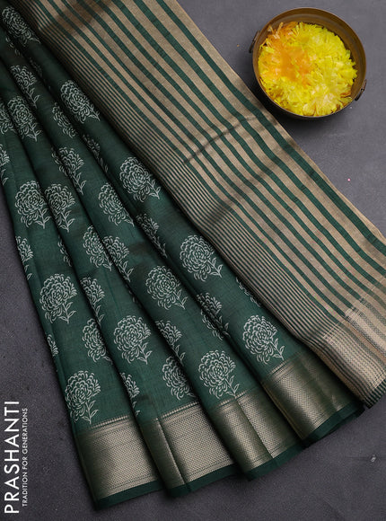 Semi raw silk saree bottle green with allover floral prints and zari woven border