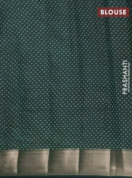 Semi raw silk saree bottle green with allover floral prints and zari woven border