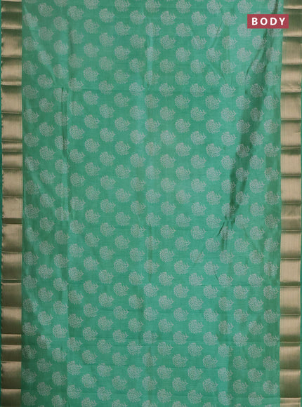 Semi raw silk saree light green with allover floral prints and zari woven border