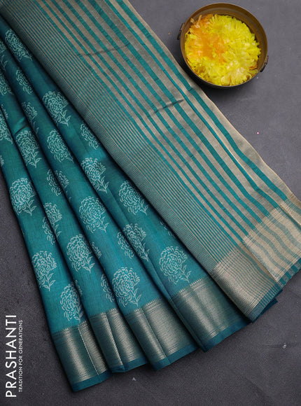 Semi raw silk saree cs blue with allover floral prints and zari woven border