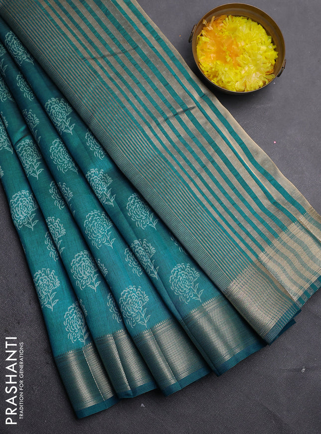 Semi raw silk saree cs blue with allover floral prints and zari woven border