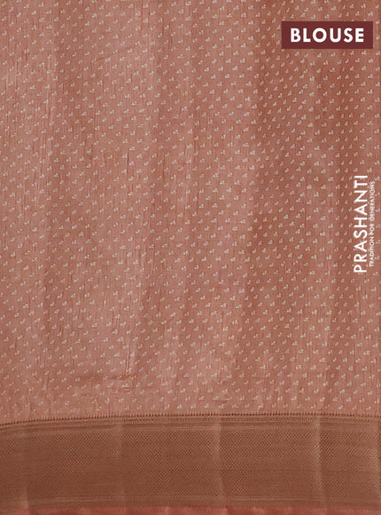 Semi raw silk saree pastel peach with allover floral prints and zari woven border