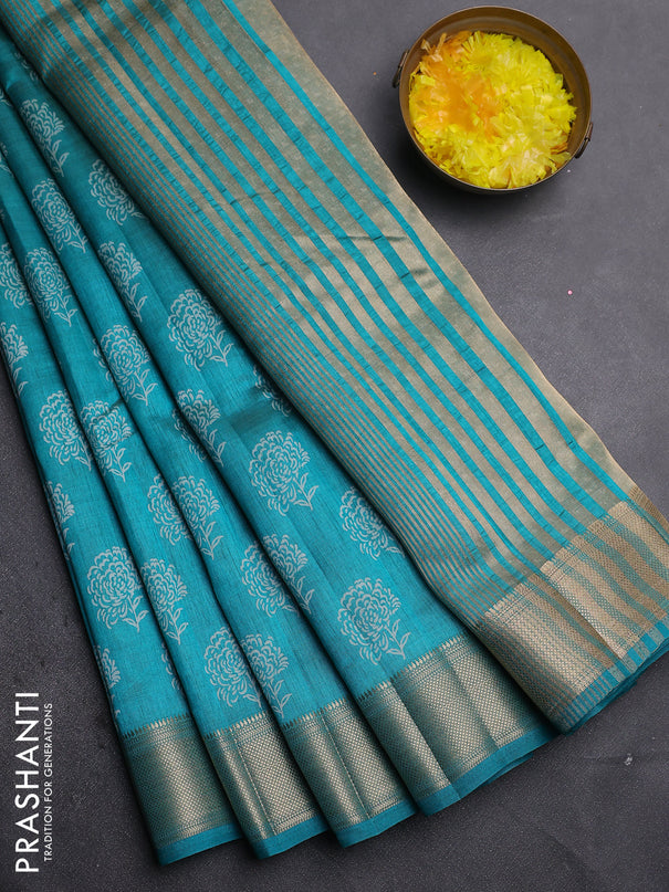 Semi raw silk saree teal green with allover floral prints and zari woven border