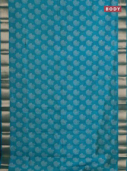 Semi raw silk saree teal green with allover floral prints and zari woven border