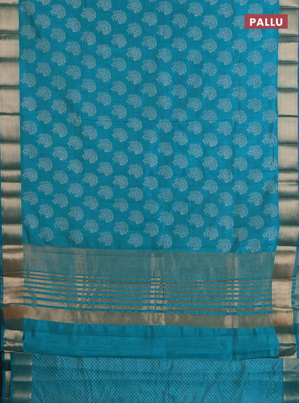 Semi raw silk saree teal green with allover floral prints and zari woven border