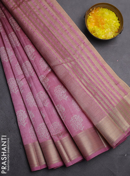 Semi raw silk saree mauve pink with allover floral prints and zari woven border