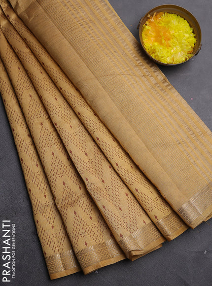Semi raw silk saree sandal with allover zigzag prints and zari woven border