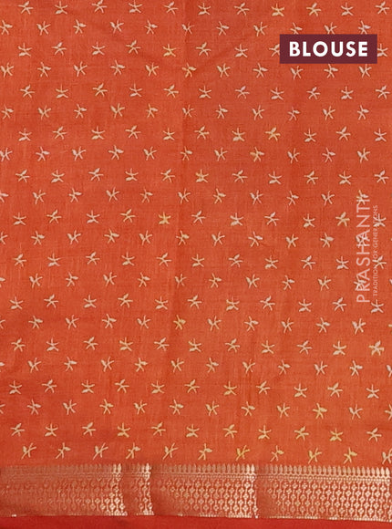 Semi raw silk saree rust shade with allover zigzag prints and zari woven border