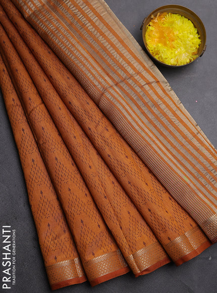 Semi raw silk saree dark mustard with allover zigzag prints and zari woven border