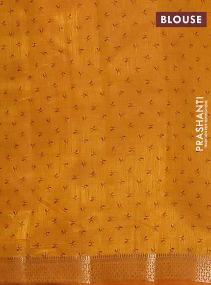 Semi raw silk saree mustard yellow with allover zigzag prints and zari woven border