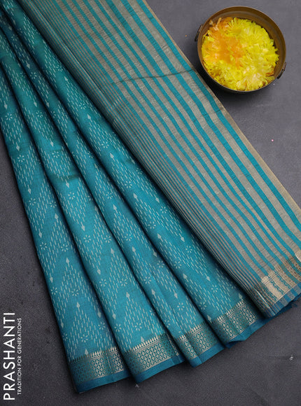Semi raw silk saree cs blue with allover zigzag prints and zari woven border