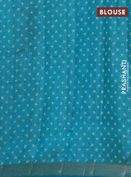 Semi raw silk saree cs blue with allover zigzag prints and zari woven border