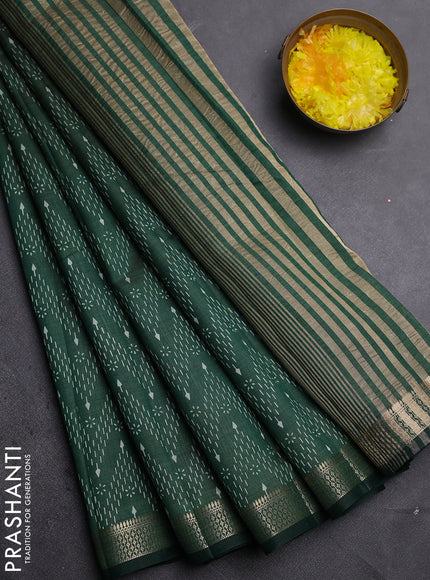 Semi raw silk saree bottle green with allover zigzag prints and zari woven border