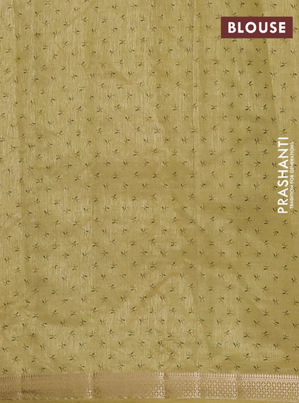 Semi raw silk saree lime green with allover zigzag prints and zari woven border
