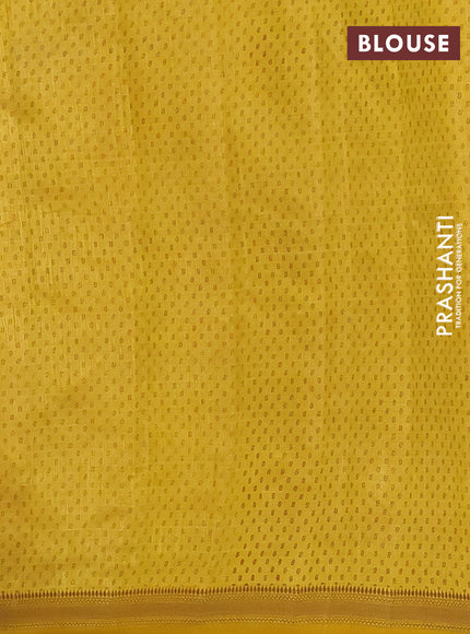 Semi raw silk saree lime green with allover butta prints and zari woven border