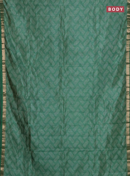 Semi raw silk saree green shade with allover butta prints and zari woven border