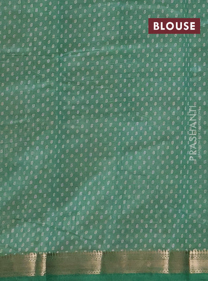Semi raw silk saree green shade with allover butta prints and zari woven border
