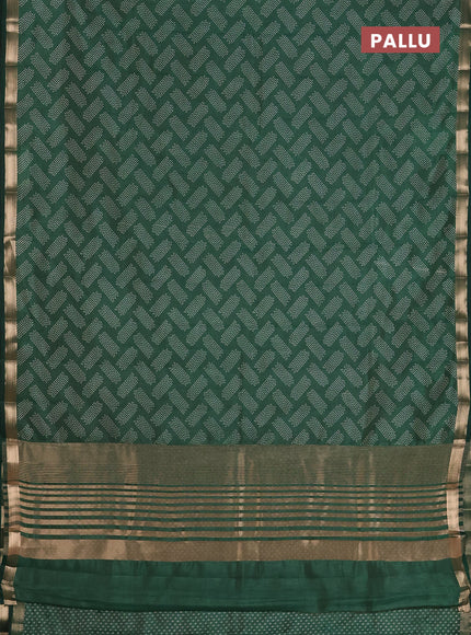 Semi raw silk saree bottle green with allover butta prints and zari woven border