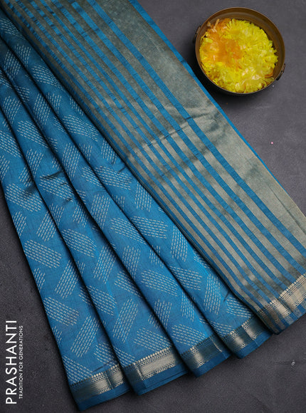 Semi raw silk saree cs blue with allover butta prints and zari woven border