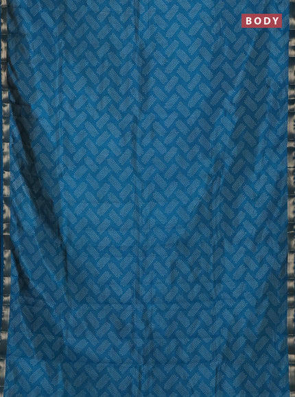 Semi raw silk saree cs blue with allover butta prints and zari woven border