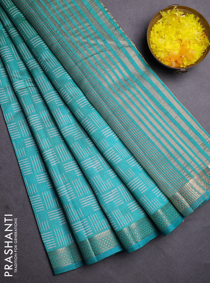 Semi raw silk saree teal blue with allover geometric prints and zari woven border