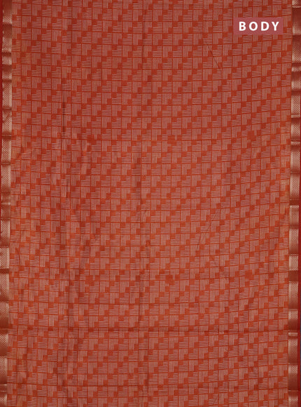Semi raw silk saree rust shade with allover geometric prints and zari woven border