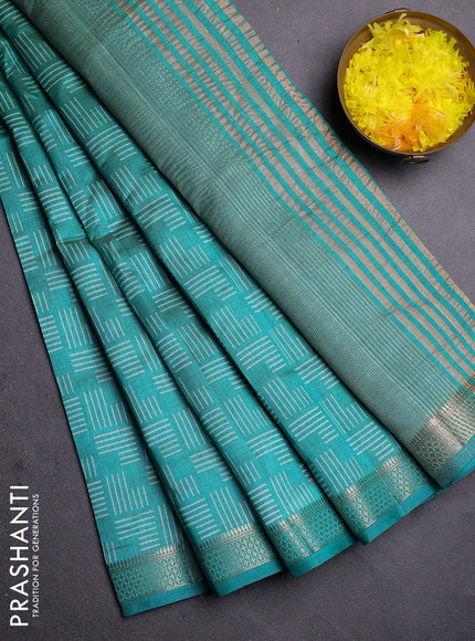 Semi raw silk saree teal green with allover geometric prints and zari woven border