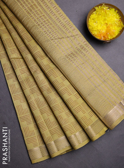 Semi raw silk saree mustard shade with allover geometric prints and zari woven border