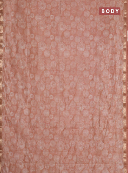 Semi raw silk saree pastel peach with allover geometric prints and zari woven border