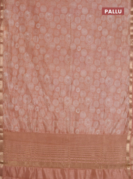 Semi raw silk saree pastel peach with allover geometric prints and zari woven border