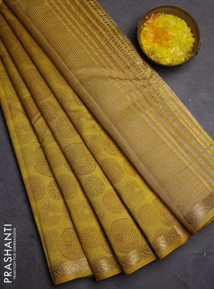 Semi raw silk saree lime yellow with allover geometric prints and zari woven border