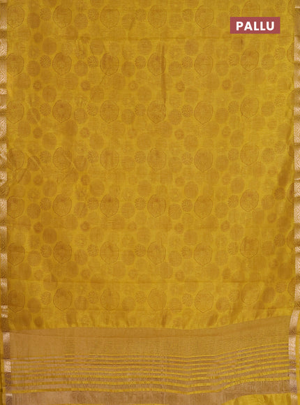 Semi raw silk saree lime yellow with allover geometric prints and zari woven border
